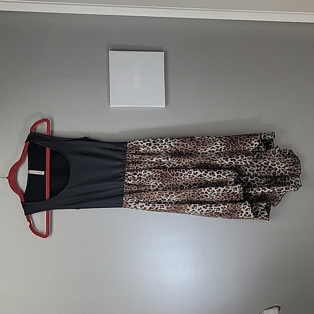A+ Ellen faux leather top with asymmetrical Leopard print Skirt sz 2
